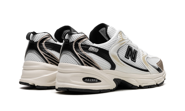 Runner 530 White Gold Black
